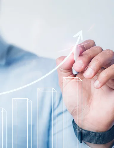 Professional working on scriptwriting and storyboarding on a laptop.